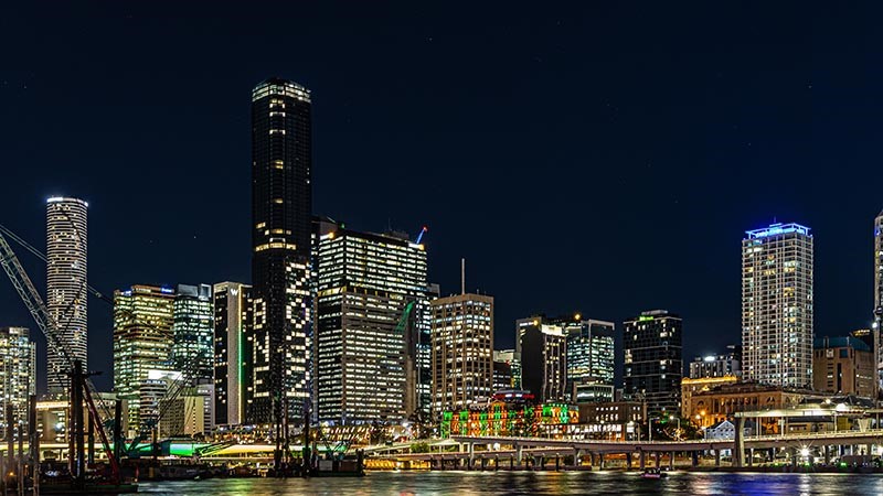 Buildings lit up anticipating Brisbane Olympics 2032.